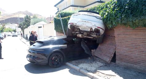 Porsche Taycan Scoops Up And Crashes Macan Into A Brick Wall Carscoops