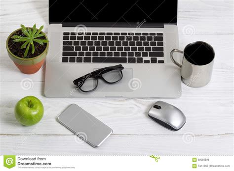 Clean And Organized Work Space On White Desktop Stock Photo Image