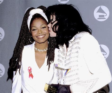 He Planted A Kiss On His Sister Janets Cheek At The 1993
