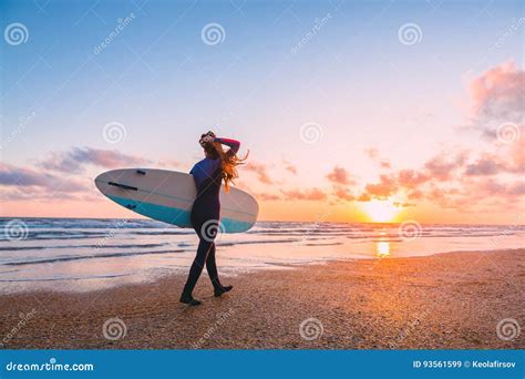 Surf Girl With Surfboard Looking At Ocean Beautiful Surfer Woman At