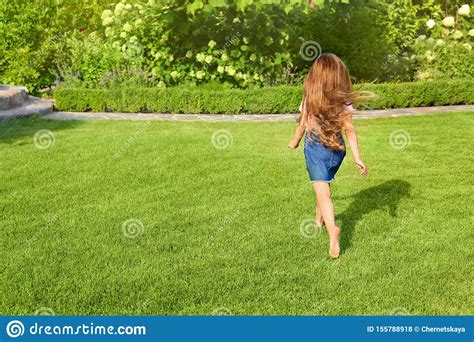 Cute Little Girl Running In Green Park Stock Photo Image Of Little