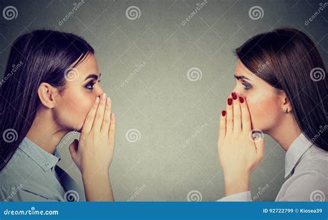 Two Women Whispering A Gossip Secret To Each Other Stock Image Image Of Copy Hide 92722799