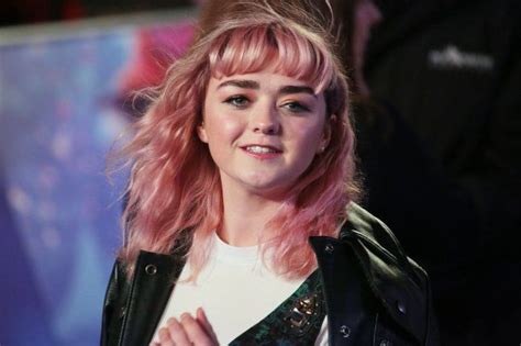 A Close Up Of A Person Wearing A Black Jacket And White Shirt With Pink