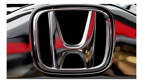 Honda lowers profit outlook for a second time amid chip shortage | Reuters