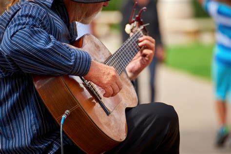 Free Photo Old Man Playing Guitar On The Street