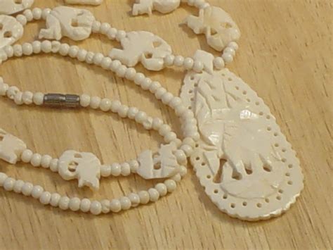 Vintage Faux Ivory Carved Elephant Necklace