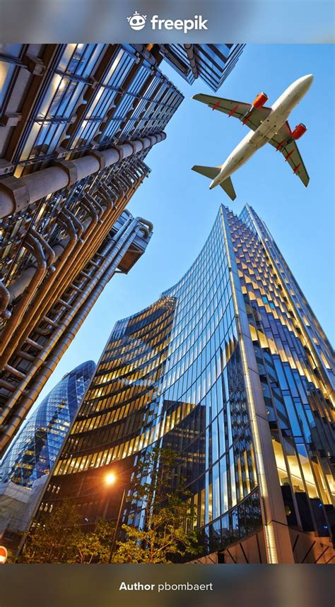 A Jet Plane Flying Over The City In 2021 Plane Photography Travel