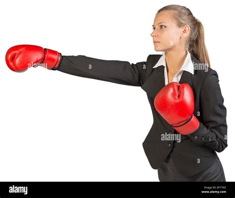 Businesswoman Wearing Boxing Gloves Punching Stock Photo Alamy