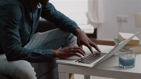 Close Up Black Man Hands Browsing Using Laptop Computer Searching
