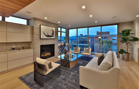 Modern Living Room With Fireplace And Brick Wall In Luxury Home