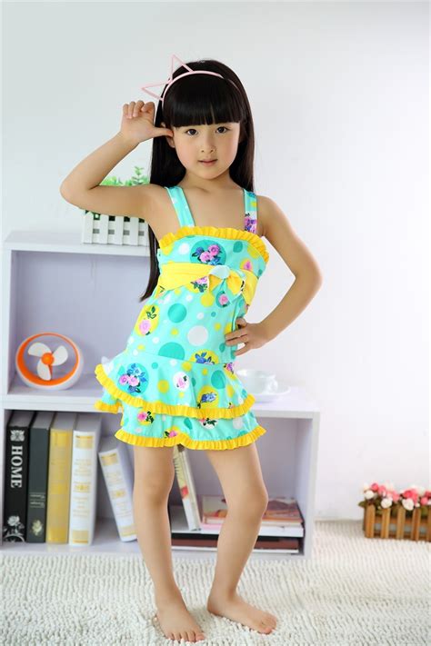 Sisters communicate while relax in bedroom. 2015Free shipping Cute baby little girls dot string Bikini ...