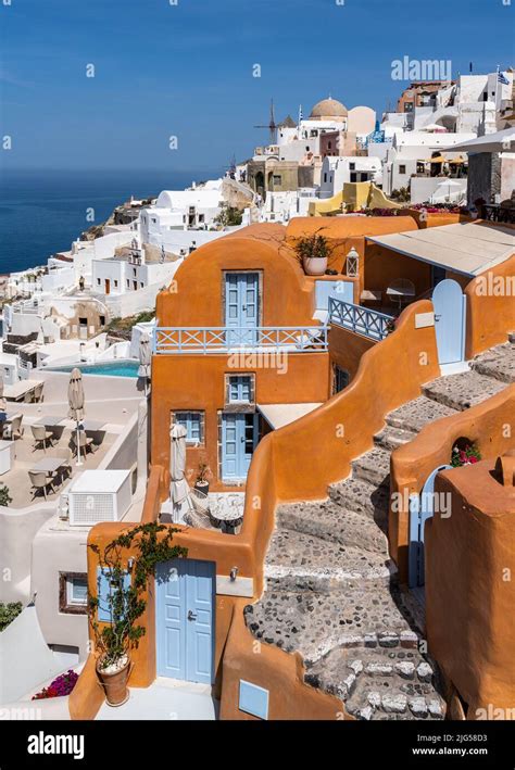 Colorful Typical Cave Houses In Oia The Most Iconic Village Of