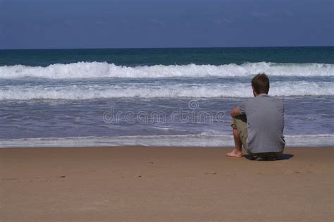 By The Sea Young Man Sitting By The Sea Spon Young Sea