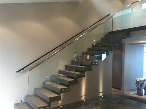 Milan vision glass balustrade and banisters in black walnut exclusive stair banister railings for staircases and landings this is a. Glass Stair Rail with Standoffs • OT Glass