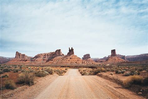 Desert Road And Mountains By Stocksy Contributor Juno Stocksy