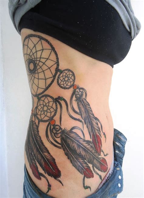They consist of a willow hoop that contains netting or web with beads or feathers hanging from it. 25 Dream Catcher Tattoos For Women - Flawssy