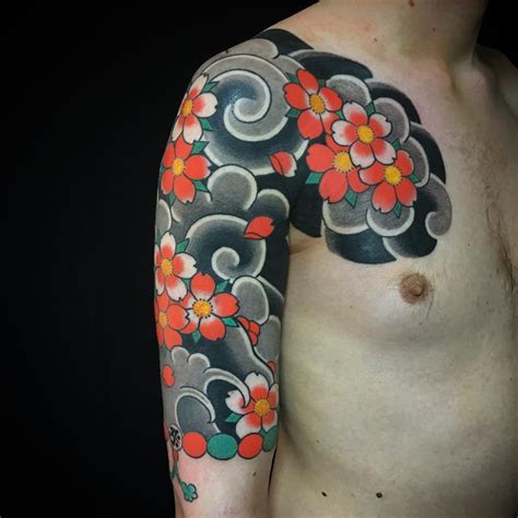 Cherry blossom shows the short and unpredictable nature of life. Tattoo uploaded by Ross Howerton | A gorgeous half-sleeve ...