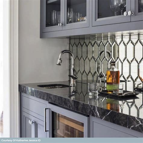 A mirrored kitchen backsplash is a good small kitchen design addition to make the space feel large and brighter, plus, it can provide an intriguing new perspective. Beveled Paris Gray Hexagon Polished Glass Tile in 2020 ...