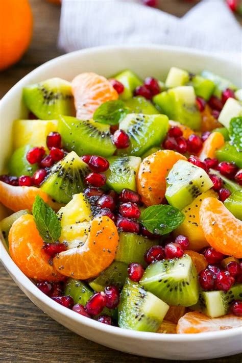 This simple fruit salad is made with fresh strawberries, kiwi, honey, and mint. Winter Fruit Salad - Dinner at the Zoo