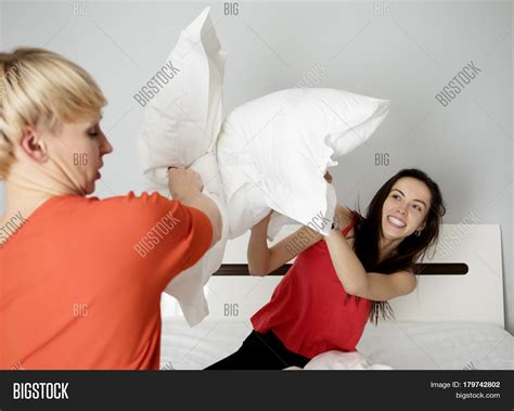 Woman Pillow Fight Image Photo Free Trial Bigstock