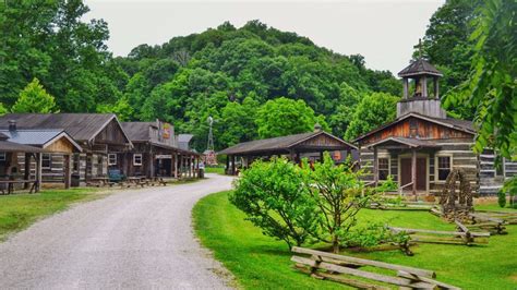 Virginia's blue ridge is open for business! Heritage Farm Is A Log Cabin Village In West Virginia That ...