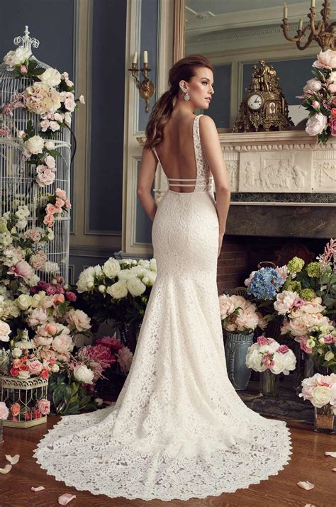 Short wedding dresses can also look attractive and beautiful and they can also make you feel like a fairytale princess. Dramatic Lace Wedding Dress - Style #2154 | Mikaella Bridal