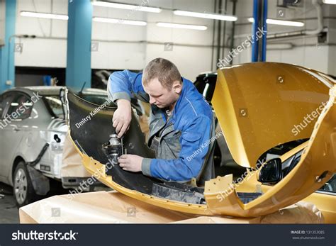 Professional Repairman Worker Automotive Industry Grinding Stock Photo