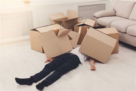 Best Worker Lying On The Floor In Warehouse Stock Photos Pictures