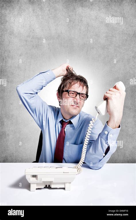 Angry Worker Pulling His Hair Stock Photo Alamy