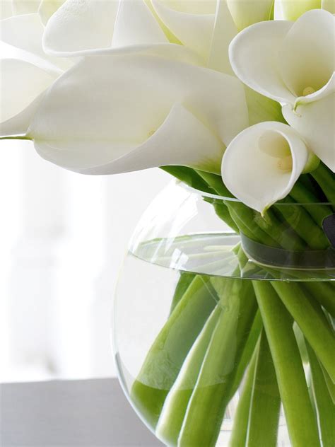 Another great gift to include with your flowers and notes is a box or basket of chocolates. Luxury White Calla Lily Globe