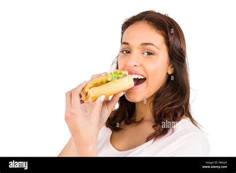 Smiling Woman Eating Sandwich Stock Photo Alamy