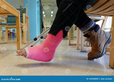 Woman With Leg Cast And Crutches In Hospital Royalty Free Stock Photo
