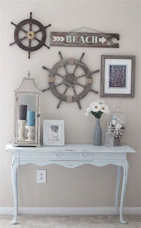 There Is A White Table With Pictures On It And A Ship Wheel Mounted To