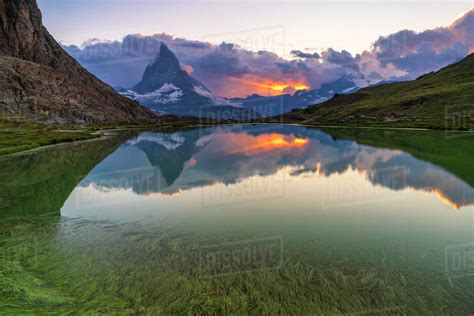 Sunset Over The Matterhorn Reflected In Lake Riffelsee Zermatt Canton