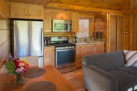 Pet friendly rustic and refined vacation cabins with fishing, swimming, floating. 392 Sq. Ft. ESCAPE Cabin