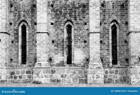Detail Of Old Cathedral Monastery With Medieval Stone Brick Wall And