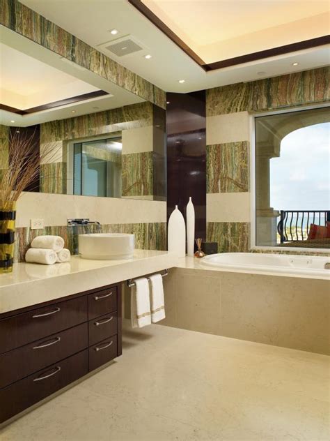Whatever the function of your basement is, whether it is for a working space, library, or a playground, adding a bathroom is a necessity. Basement Bathrooms: Ideas and Designs | HGTV