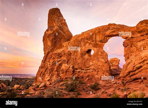 Turret Arch At Sunrise In Arches National Park In Utah Stock Photo Alamy