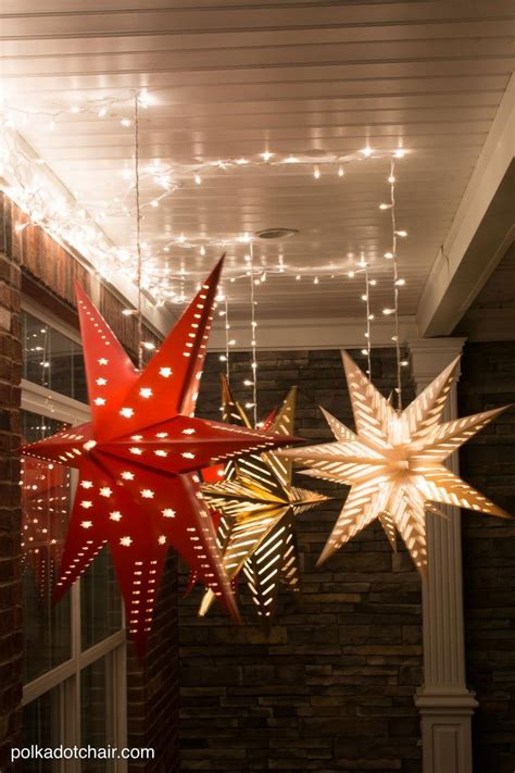 I'm decorating for christmas on november 1st. Christmas Porch Decorating Ideas; Hanging Star Luminaries ...