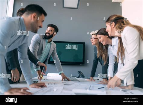 Group Of Business People Collaborating In Office Stock Photo Alamy