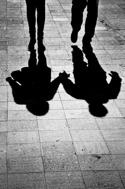 Shadow Of Couple Holding Hands Stock Photos Pictures And Royalty Free