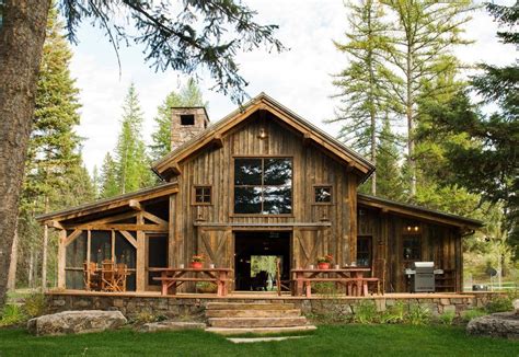 I always love barnhouses because of the big open plan that's also the case here and it's combined with concrete floors and stone walls which really adds to the barn feel. Image result for carriage house post and beam | Barn house ...
