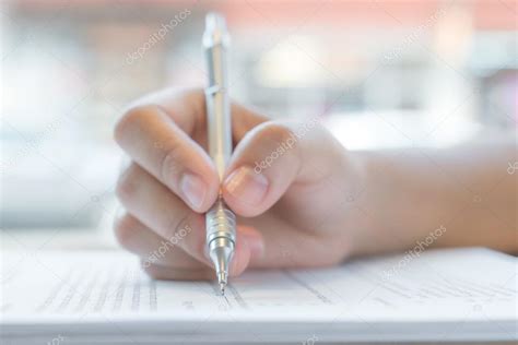Hand Holding Pen — Stock Photo © Jannystockphoto 102538046