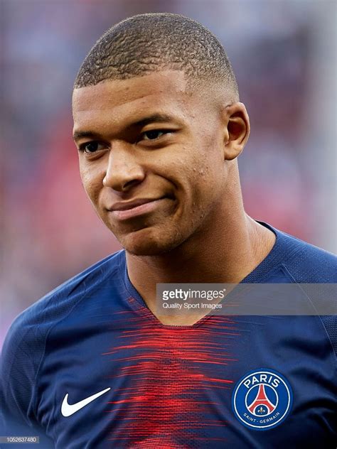 Attacking midfielder (left, right), forward. Kylian Mbappe of Paris Saint Germain looks on prior to the ...