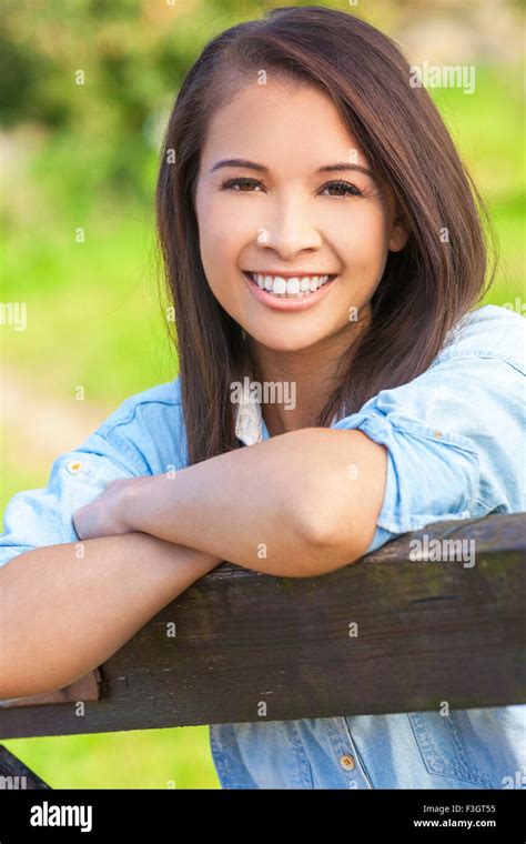 Beautiful Happy Asian Eurasian Young Woman Or Girl Wearing Denim Shirt