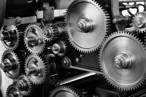 Gray Scale Photo Of Gears · Free Stock Photo