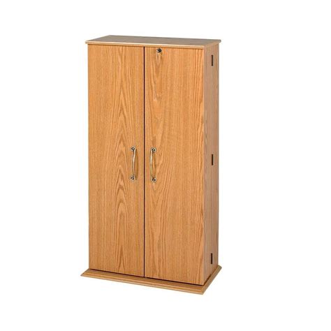 Durable cabinet is made of welded steel and holds 180 lb. Prepac Oak & Black Tall Locking Media Storage Cabinet ...