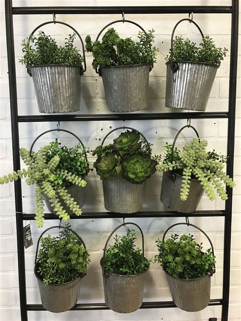 We Specialize In Home And Garden Decor This Amazing Metal Bucket Wall Planter Can Be Found At