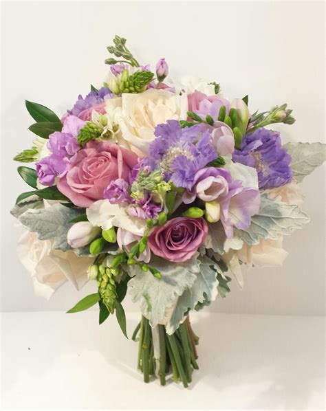 When it comes to flowers, some may think that blue is rather odd as a color to find in natural blooms, most of them having more a hue that leans towards purple rather than blue. Rustic and Natural Wedding Bouquets - Dahlia Floral Design ...