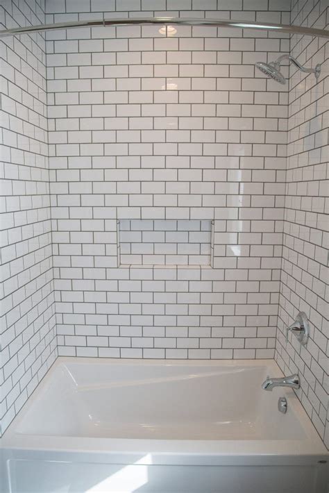 White Subway Tile Shower And Niche With Dark Grout Hall Bathroom
